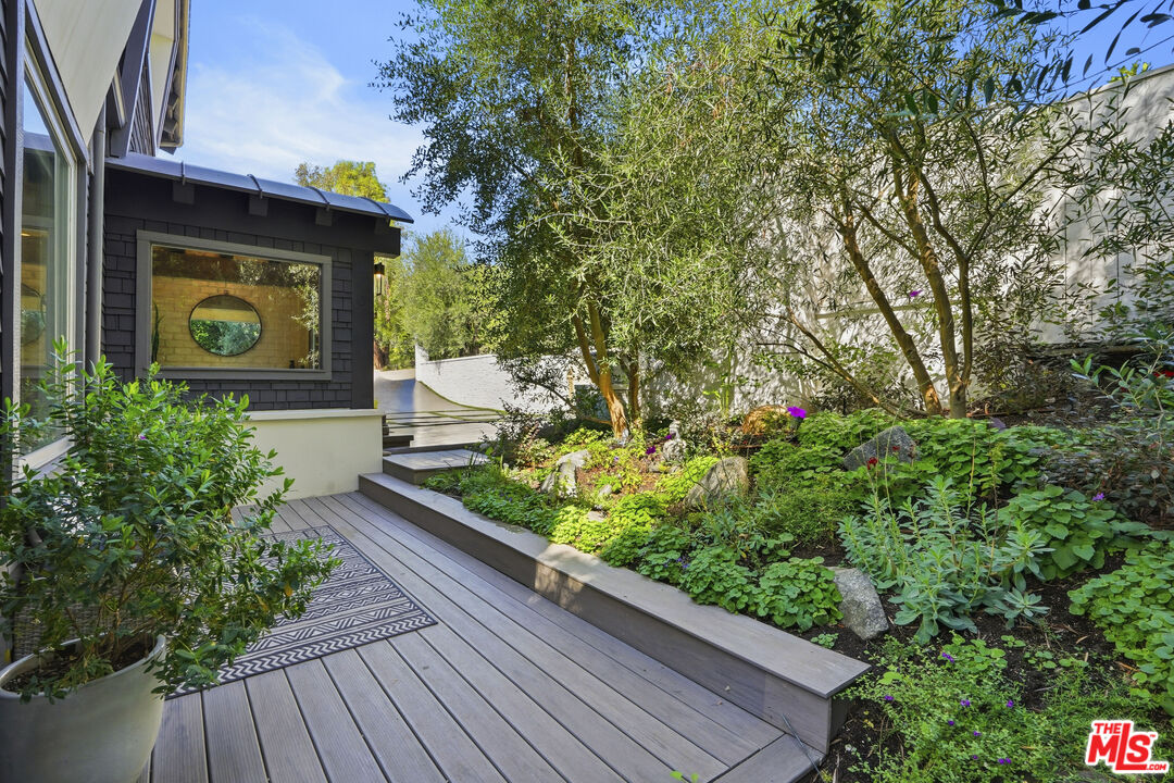 3631 Serra Road Malibu, CA 90265 - Photo 60 of 74 a sign that is on a wooden floor