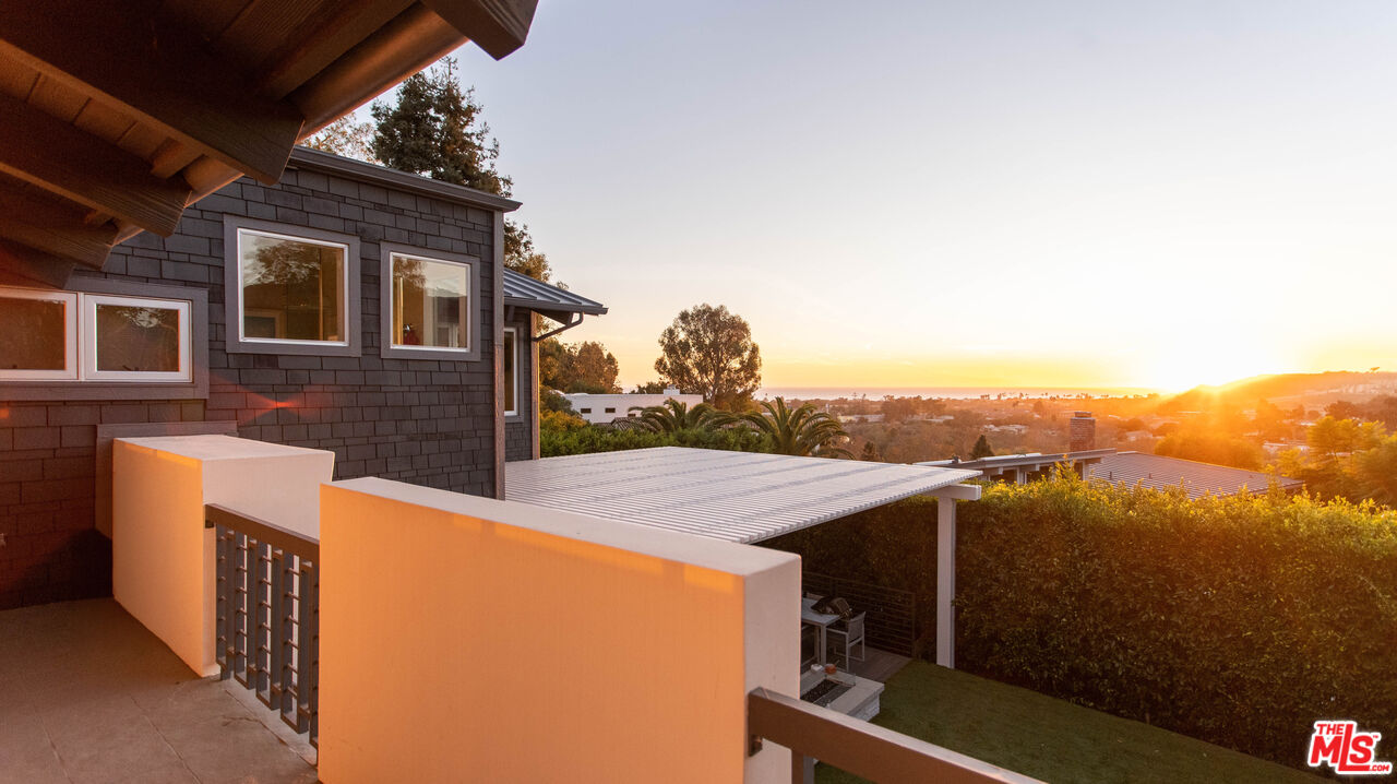 3631 Serra Road Malibu, CA 90265 - Photo 63 of 74 a view of a house with a terrace