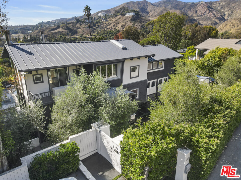 3631 Serra Road Malibu, CA 90265 - Photo 7 of 74 an aerial view of a house