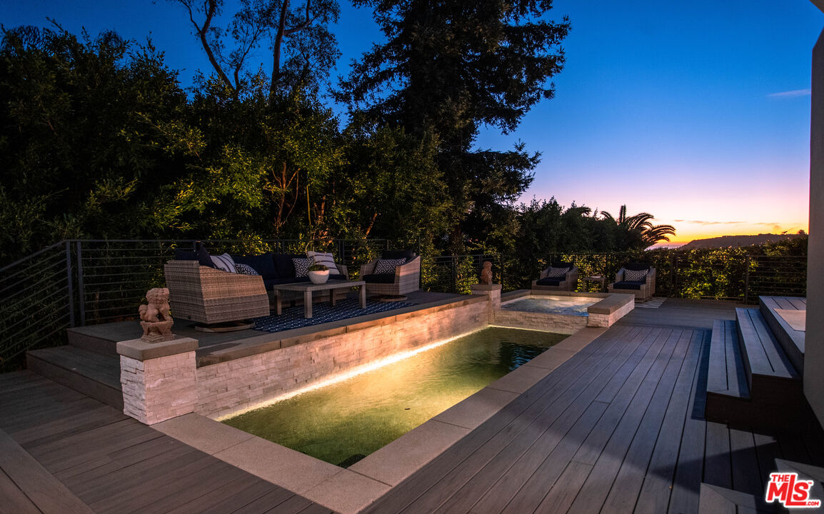 3631 Serra Road Malibu, CA 90265 - Photo 71 of 74 a view of swimming pool with seating space