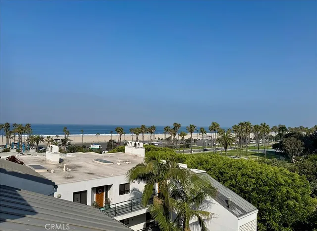 a view of residential houses with outdoor space