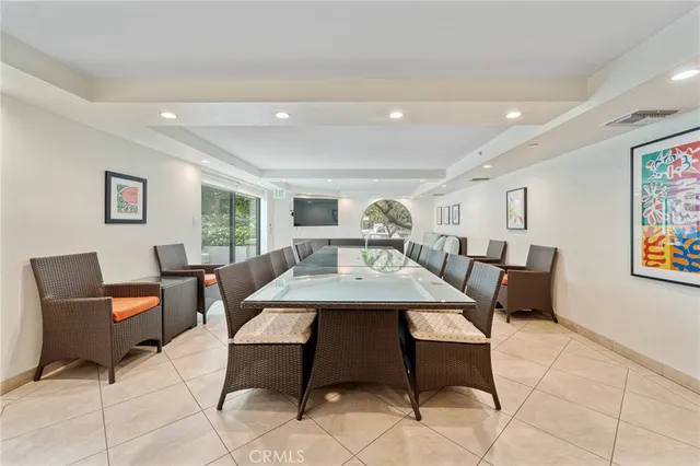 a view of a livingroom with furniture and a window