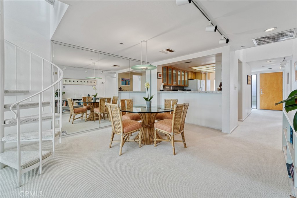 2910 Neilson Way, Unit 503 Santa Monica, CA 90405 - Photo 9 of 27 a view of a dining room with furniture