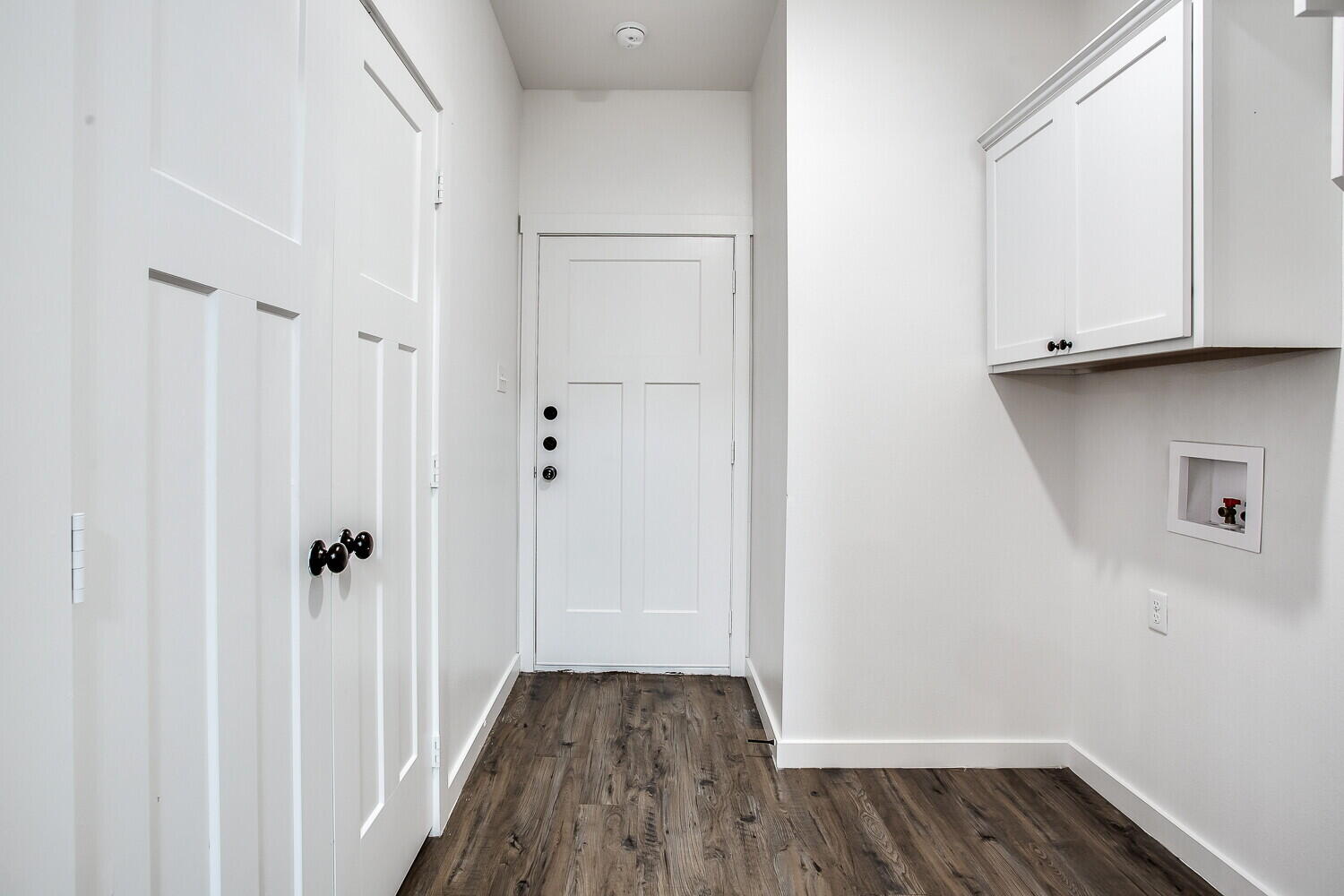2539 138th Street Lubbock, TX 79423 - Photo 10 of 15 a view of a hallway with wooden floor