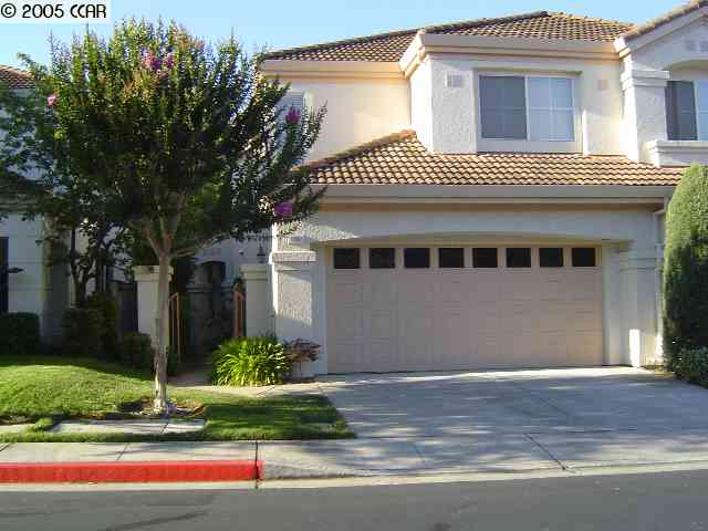1082 Vista Pointe Circle San Ramon, CA 94582 - Photo 1 of 1 a front view of a house with a garden