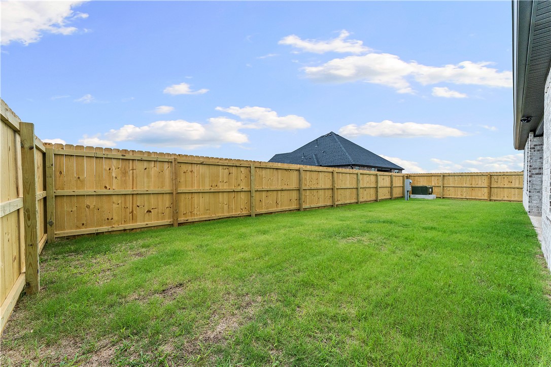 803 Jenison Road Springdale, AR 72762 - Photo 11 of 20 Fenced in Backyard