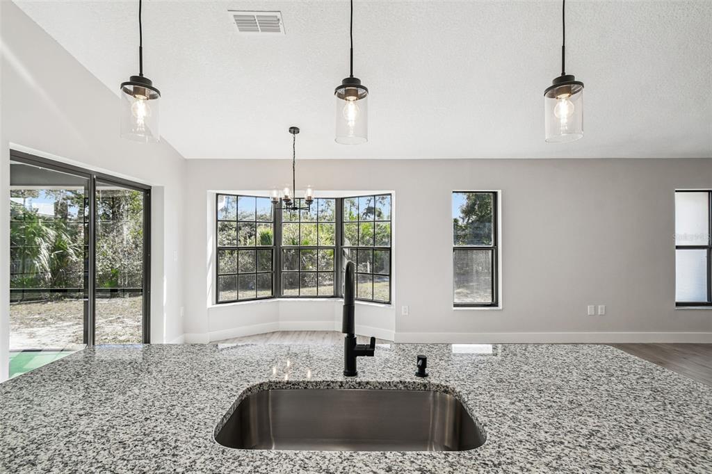 5248 Frost Road Spring Hill, FL 34606 - Photo 34 of 70 a kitchen with a sink and window