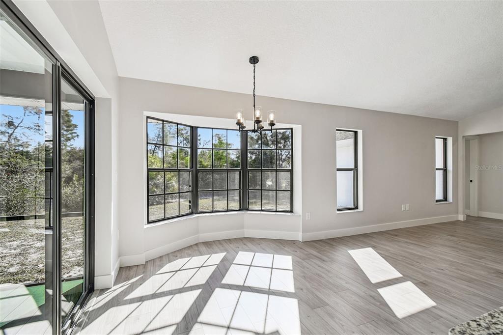 5248 Frost Road Spring Hill, FL 34606 - Photo 38 of 70 a view of empty room with windows
