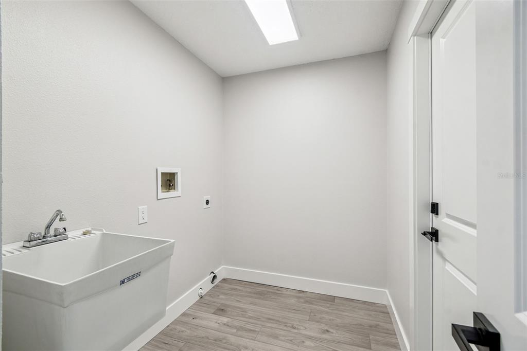 5248 Frost Road Spring Hill, FL 34606 - Photo 45 of 70 a bathroom with a sink and a vanity