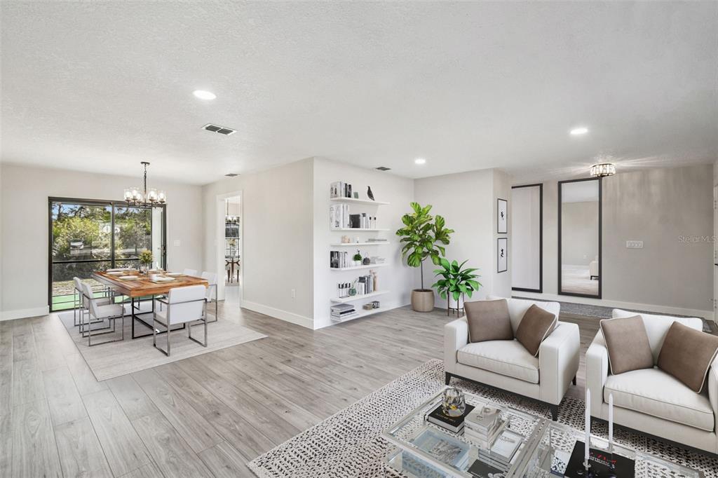 5248 Frost Road Spring Hill, FL 34606 - Photo 5 of 70 a living room with furniture and wooden floor