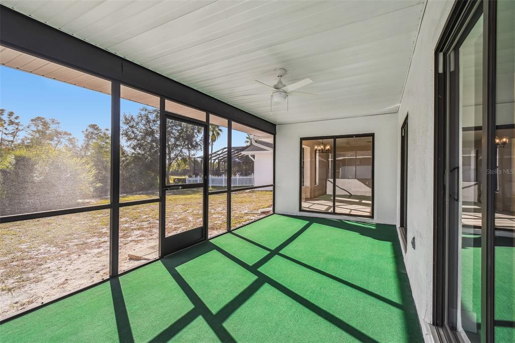 5248 Frost Road Spring Hill, FL 34606 - Photo 56 of 70 a view of a porch in front of a house with a backyard
