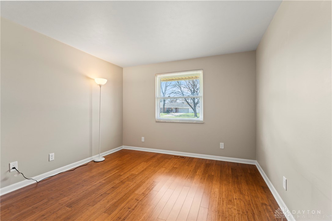 2247 East Whipp Road Dayton, OH 45440 - Photo 35 of 52 This spacious room features ample natural light and durable flooring, offering a comfortable living space.