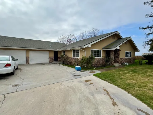 a view of a house with a patio
