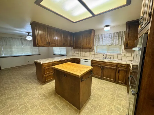 a kitchen with a cabinets and sink