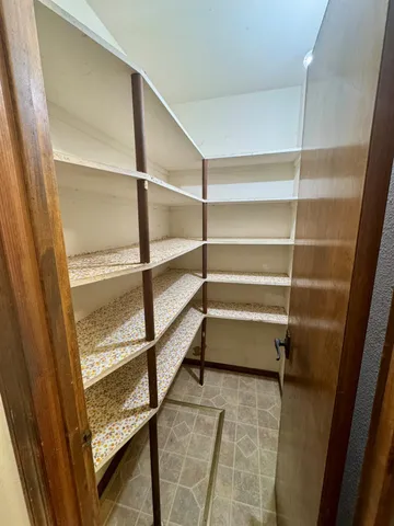 a storage room with empty racks