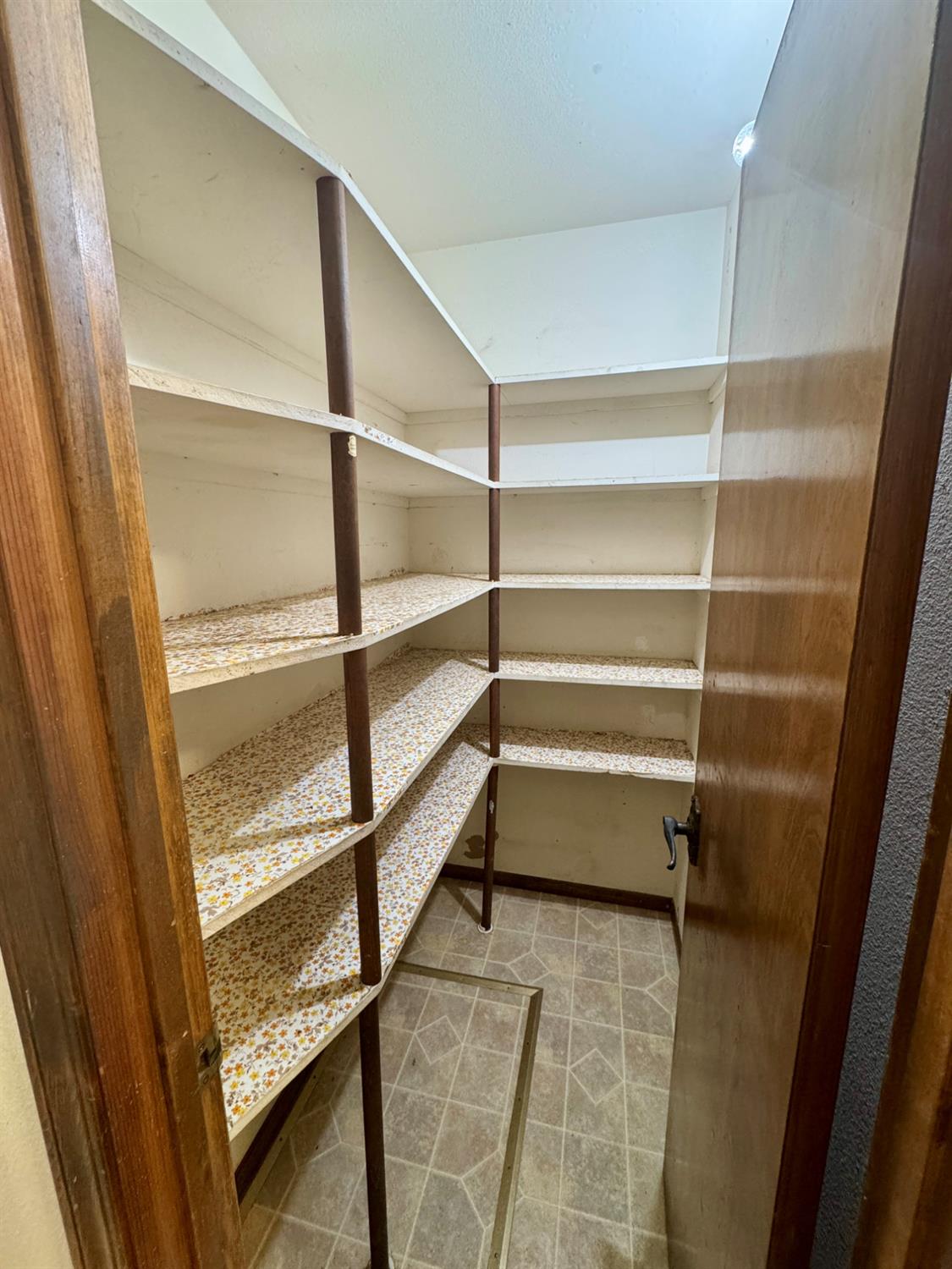 17617 West Belmont Avenue Kerman, CA 93630 - Photo 6 of 25 a storage room with empty racks