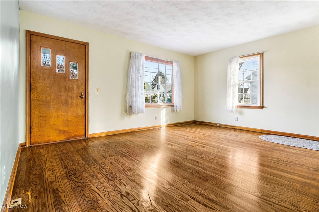 4870 15th Street Southwest Canton, OH 44710 - Photo 7 of 36 Living Room with wood finished floors and baseboards