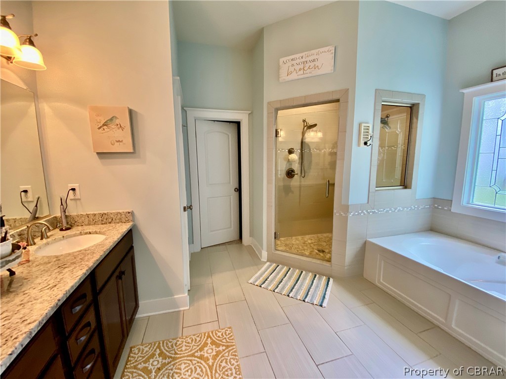 7560 Winding Jasmine Road Quinton, VA 23141 - Photo 14 of 23 Extra large bath off master bedroom with enormous walk-in closet