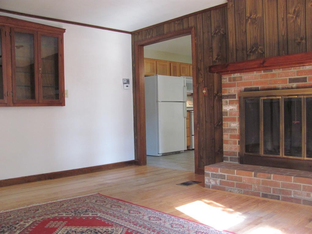 1 Sawyer Road Wells, ME 04090 - Photo 7 of 28 Wood floor and built-ins add a warm...