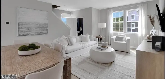a bathroom with a sink a mirror and bathtub