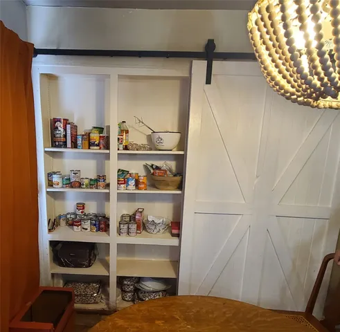 a utility room with a shower