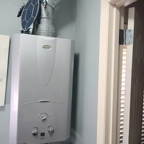 a view of yard with seating area and trees around