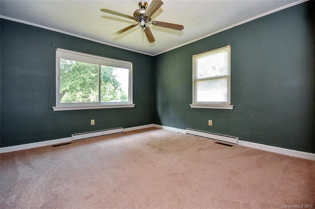 388 Shinnville Road Mooresville, NC 28115 - Photo 11 of 15 a view of an empty room with a window