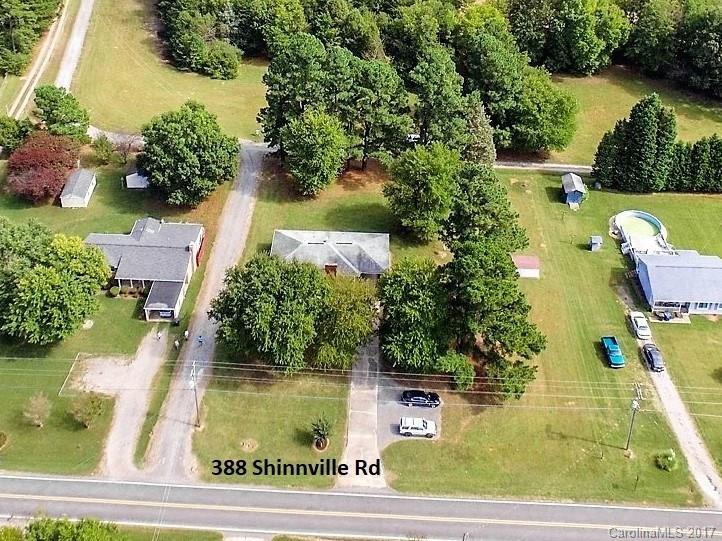 388 Shinnville Road Mooresville, NC 28115 - Photo 15 of 15 an aerial view of residential houses with outdoor space and lake view
