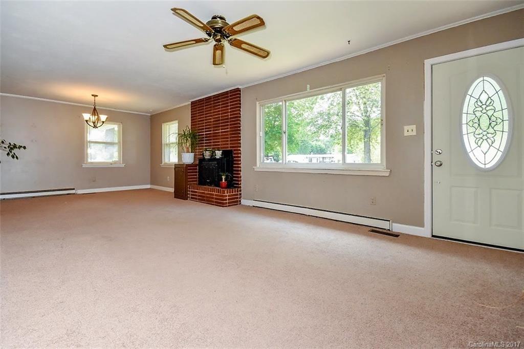 388 Shinnville Road Mooresville, NC 28115 - Photo 3 of 15 a view of an empty room with a window