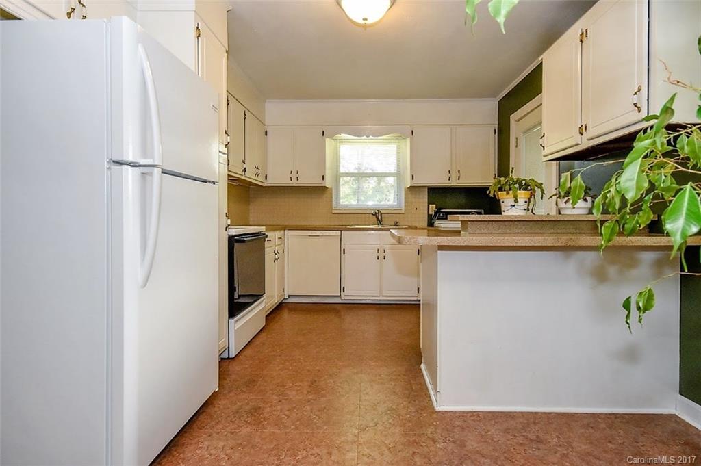388 Shinnville Road Mooresville, NC 28115 - Photo 6 of 15 a kitchen with stainless steel appliances a sink and a refrigerator
