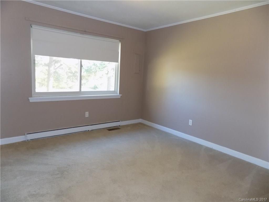 388 Shinnville Road Mooresville, NC 28115 - Photo 7 of 15 an empty room with a window