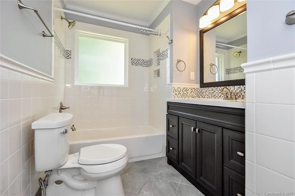 388 Shinnville Road Mooresville, NC 28115 - Photo 8 of 15 a bathroom with a sink toilet vanity and shower
