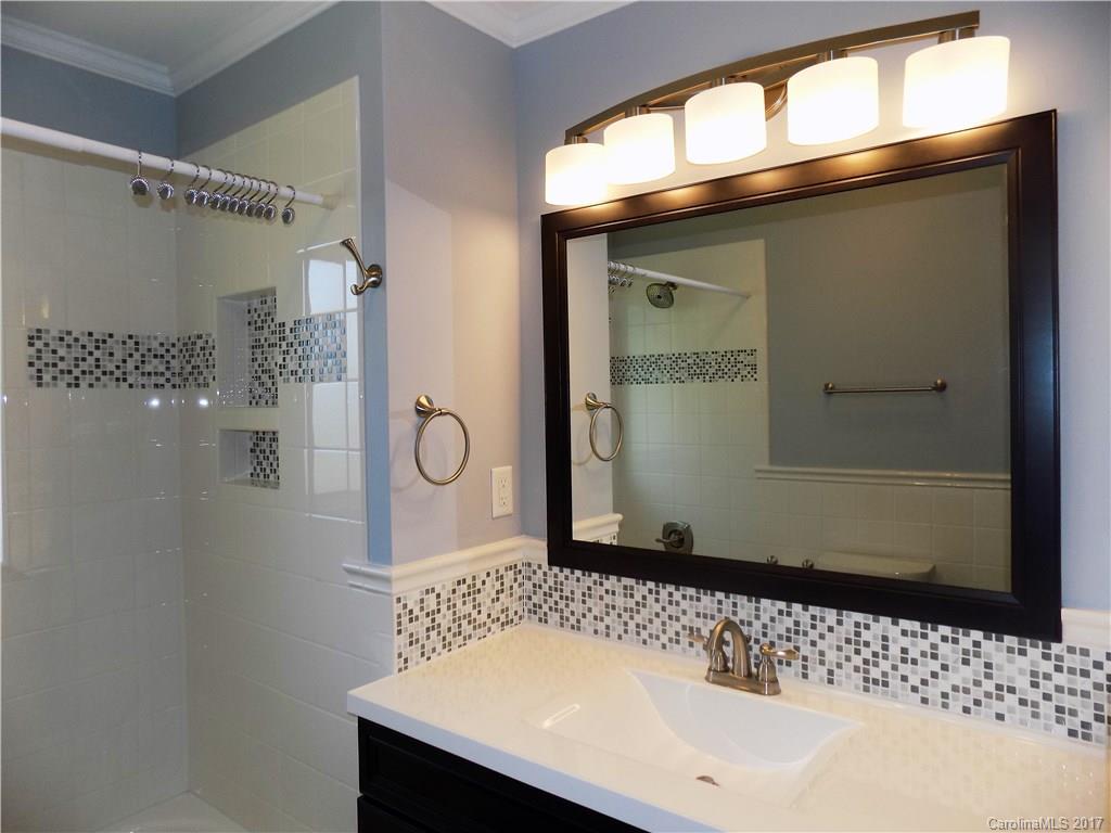 388 Shinnville Road Mooresville, NC 28115 - Photo 9 of 15 a bathroom with a sink and a mirror