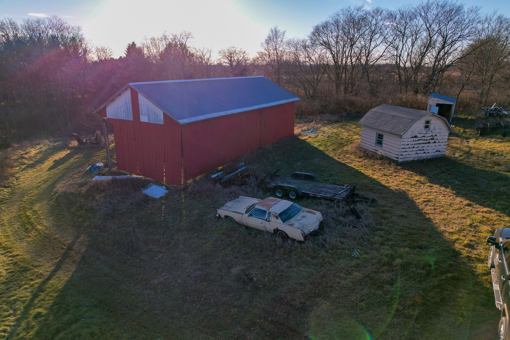 -30 Ac) Moody Road Rockton, IL 61072 - Photo 28 of 40 a backyard of a house with wooden table and chairs