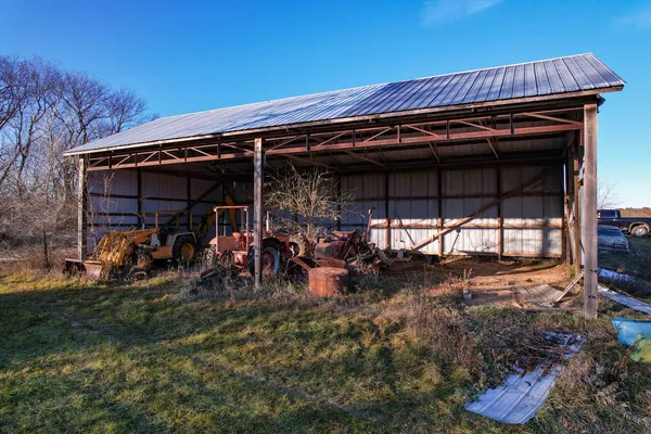 a view of a backyard with wooden floor and a lake view