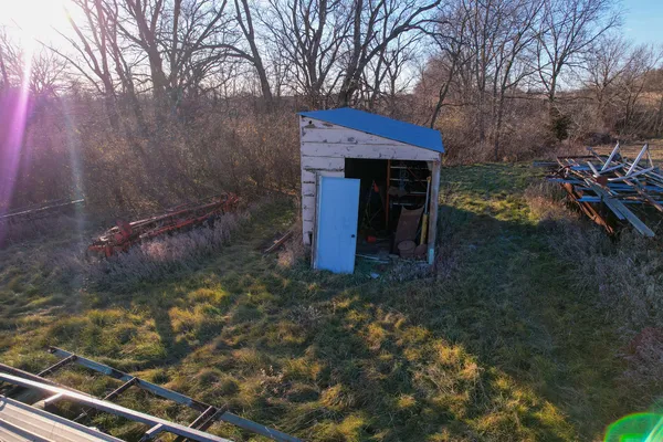 a view of a lake with a yard