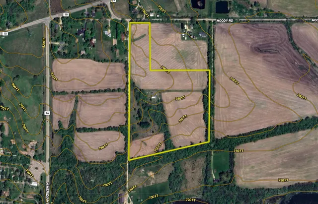 an aerial view of a highlighted house