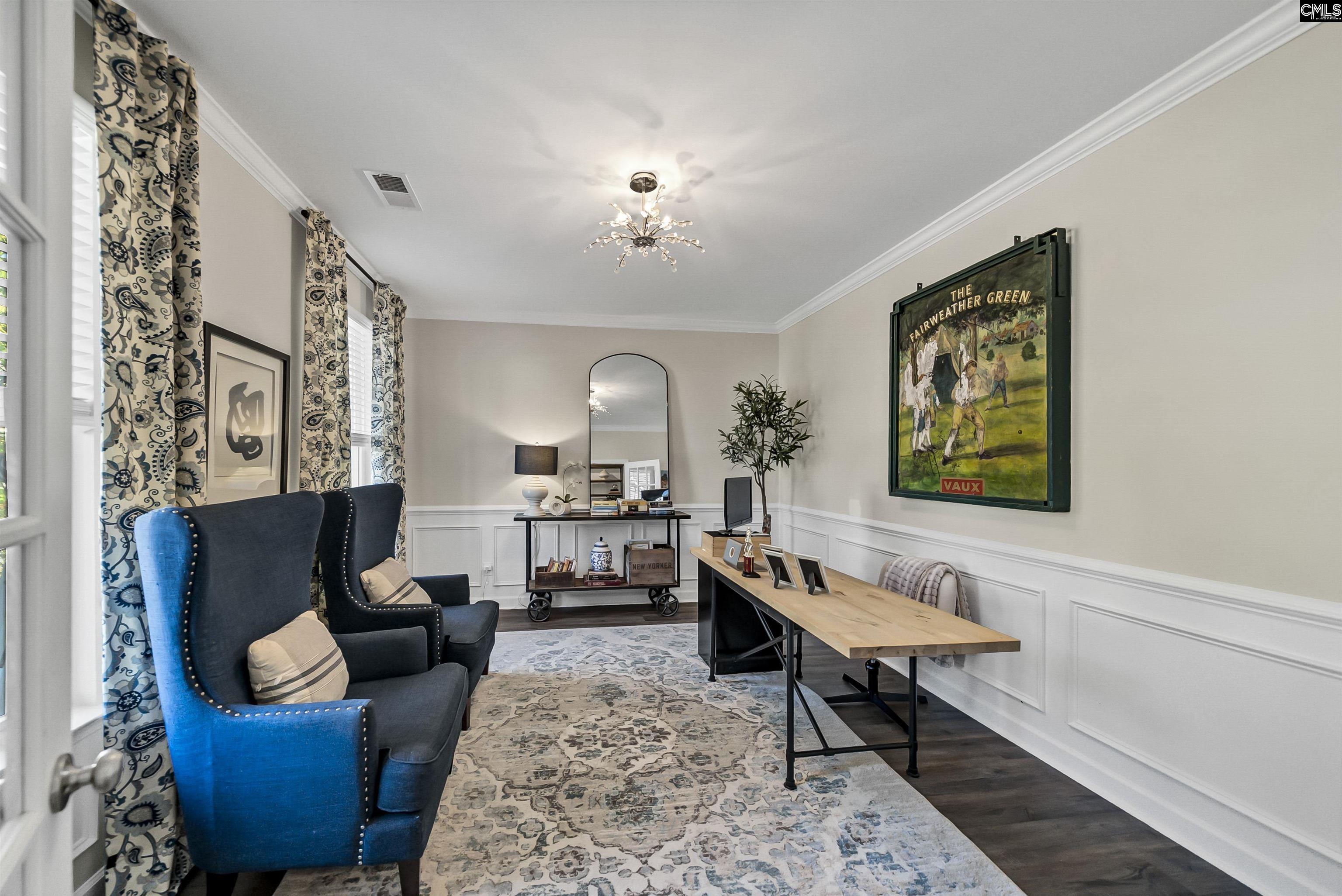 515 Malachite Lane Chapin, SC 29036 - Photo 18 of 63 a living room with furniture and a chandelier