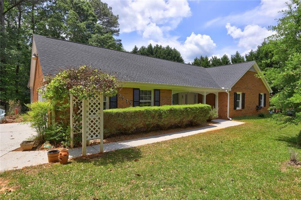 front view of a house with a yard
