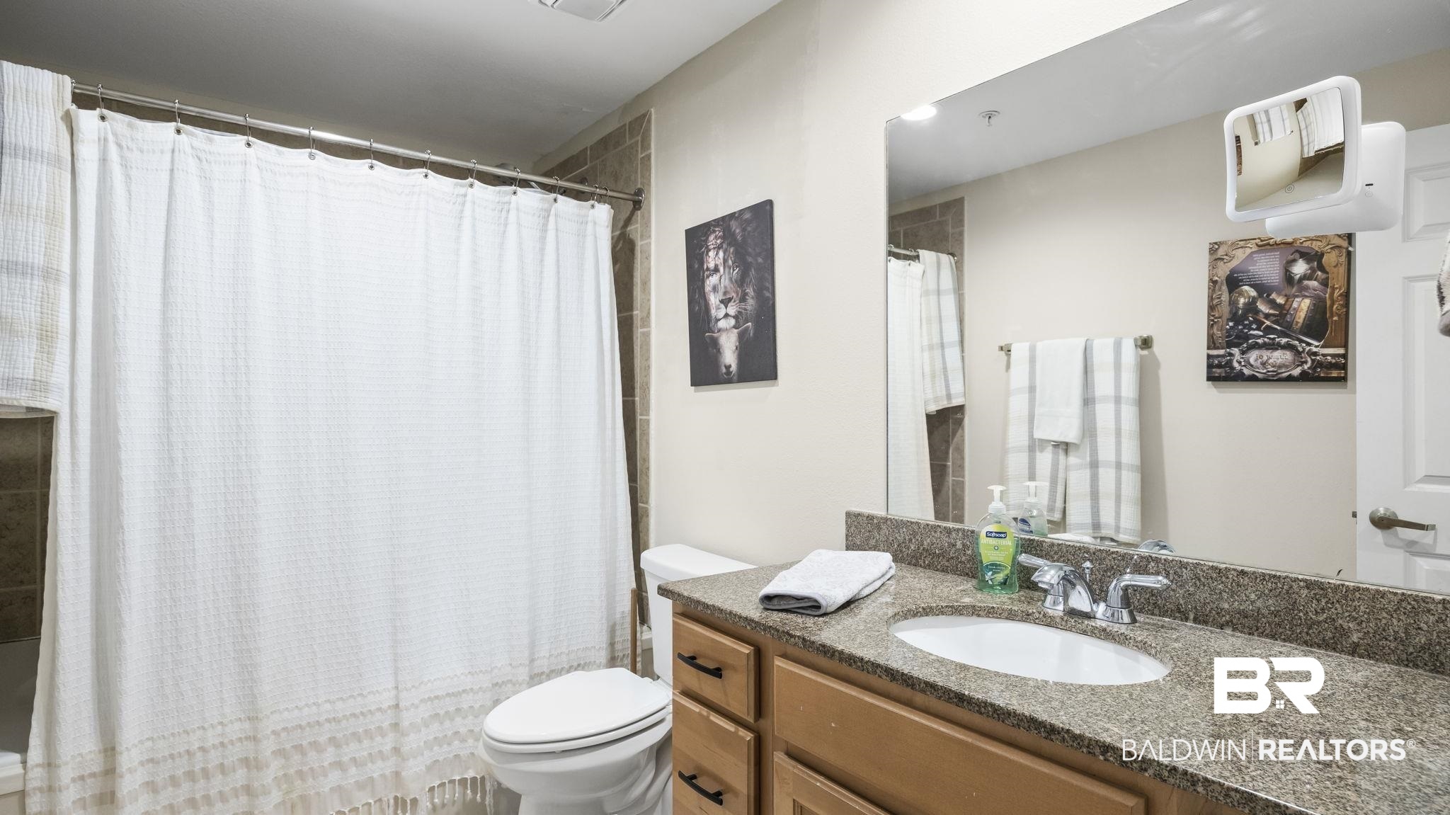 27800 Canal Road, Unit 313 Orange Beach, AL 36561 - Photo 9 of 23 Bathroom with vanity and shower / tub combo
