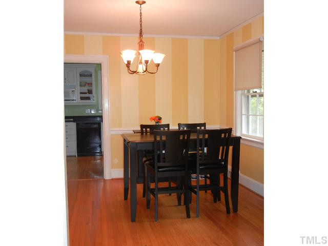 Dining Room -- No wallpaper here, that's painted stripes. Note the picture molding as well as the chairrail