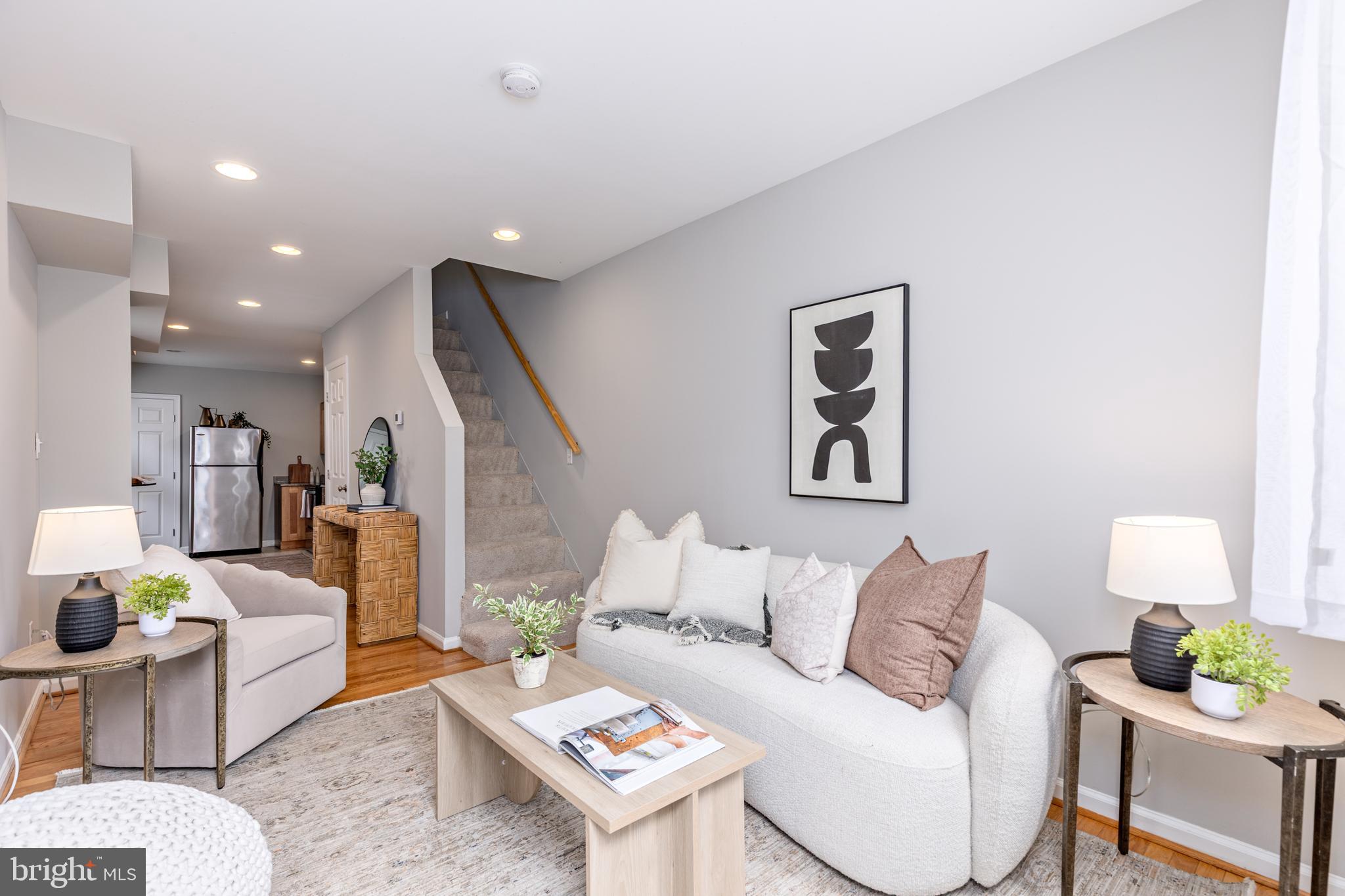 305 South Castle Street Baltimore, MD 21231 - Photo 1 of 28 a living room with furniture and wooden floor