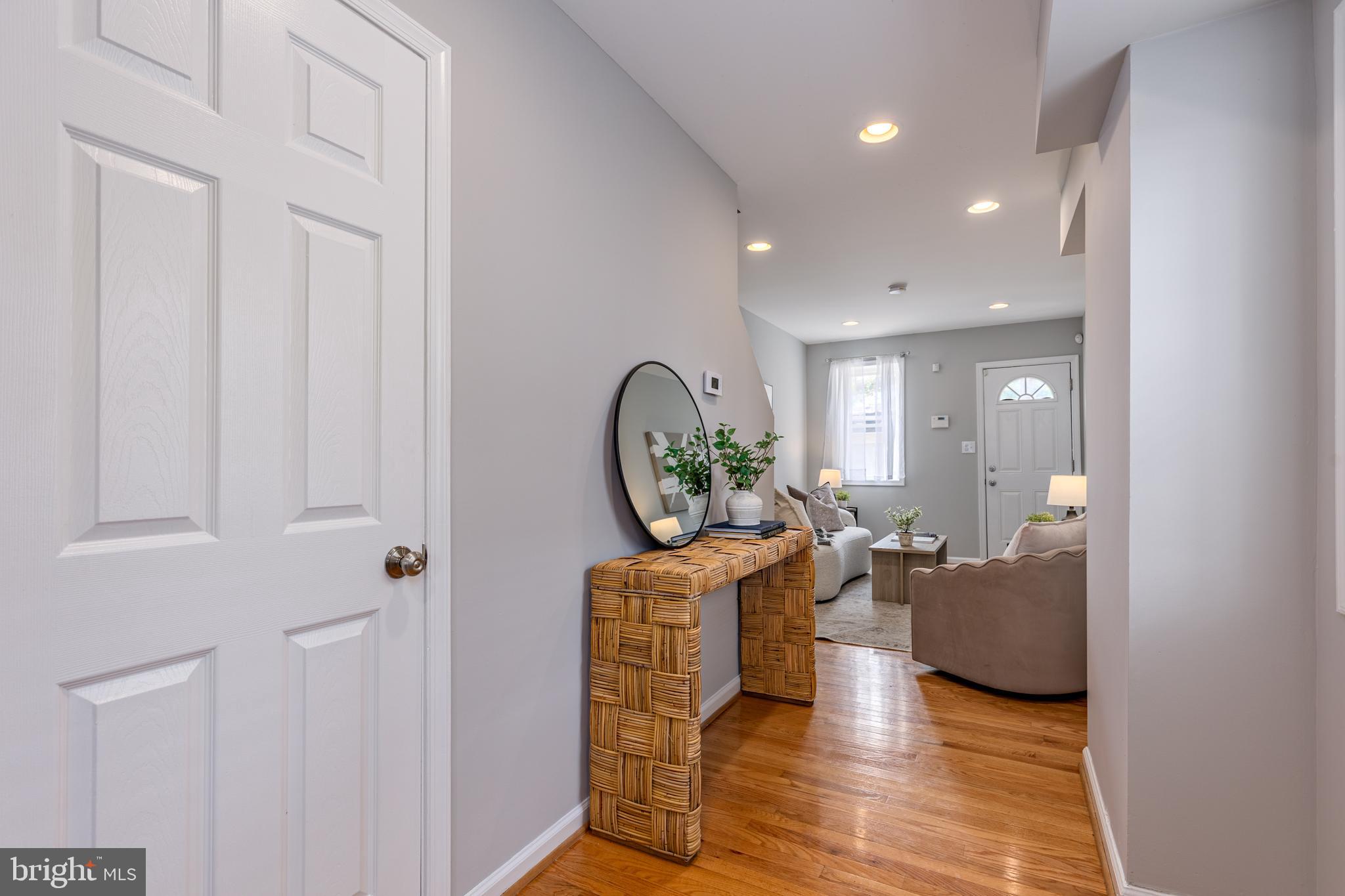 305 South Castle Street Baltimore, MD 21231 - Photo 28 of 28 a living room with furniture and a wooden floor