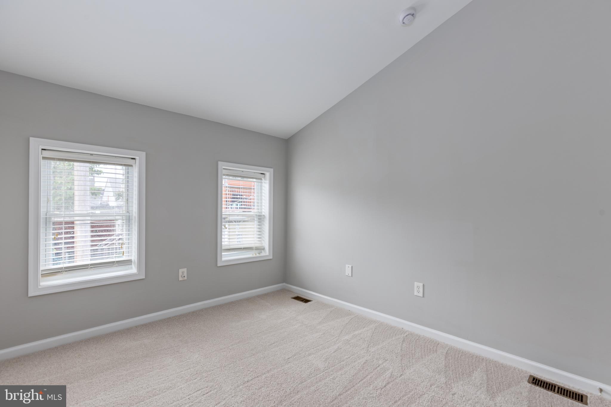 305 South Castle Street Baltimore, MD 21231 - Photo 19 of 28 an empty room with windows