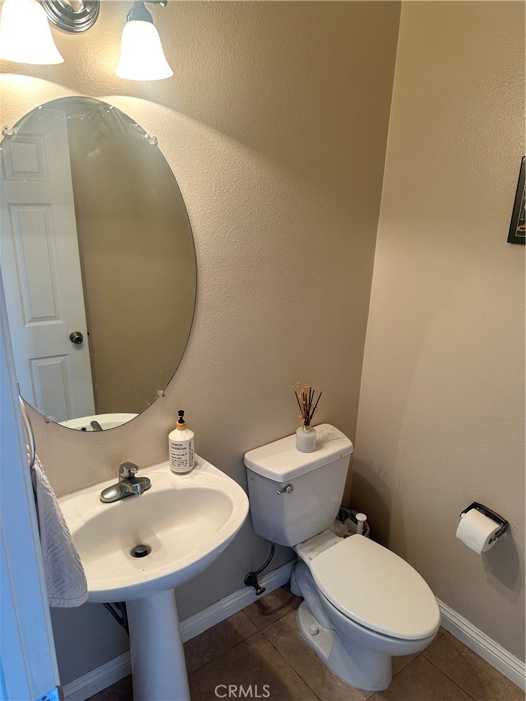 1646 Palermo Drive Riverside, CA 92507 - Photo 3 of 9 Powder Room downstairs.