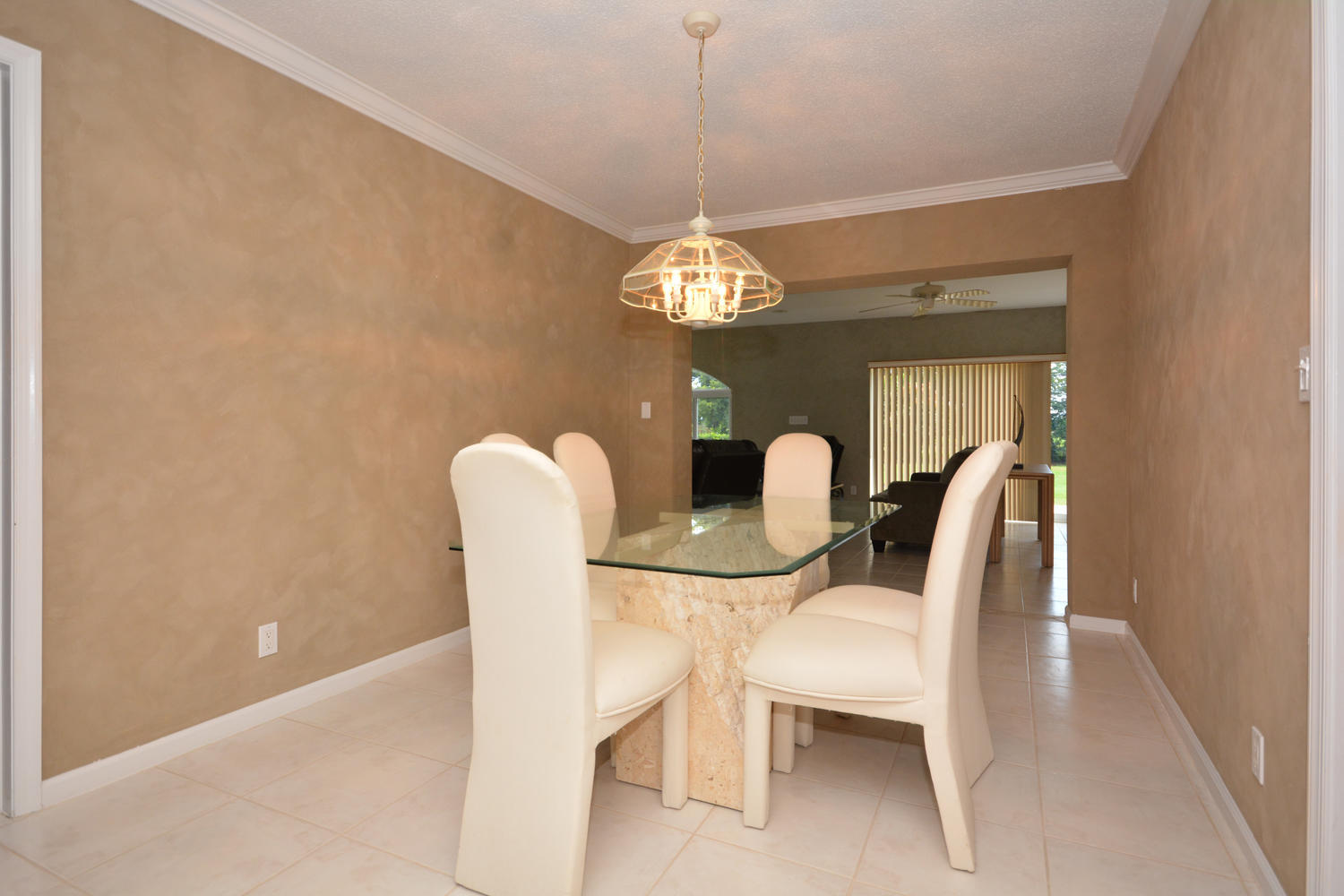 200 North Country Club Boulevard Boca Raton, FL 33487 - Photo 5 of 27 a dining room with furniture and chandelier