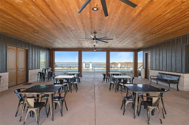 a view of a terrace with chairs