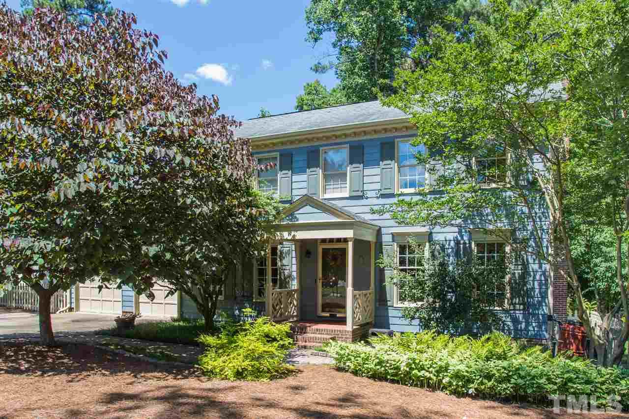 1812 Albacore Lane Raleigh, NC 27612 - Photo 1 of 30 a front view of a house with a garden