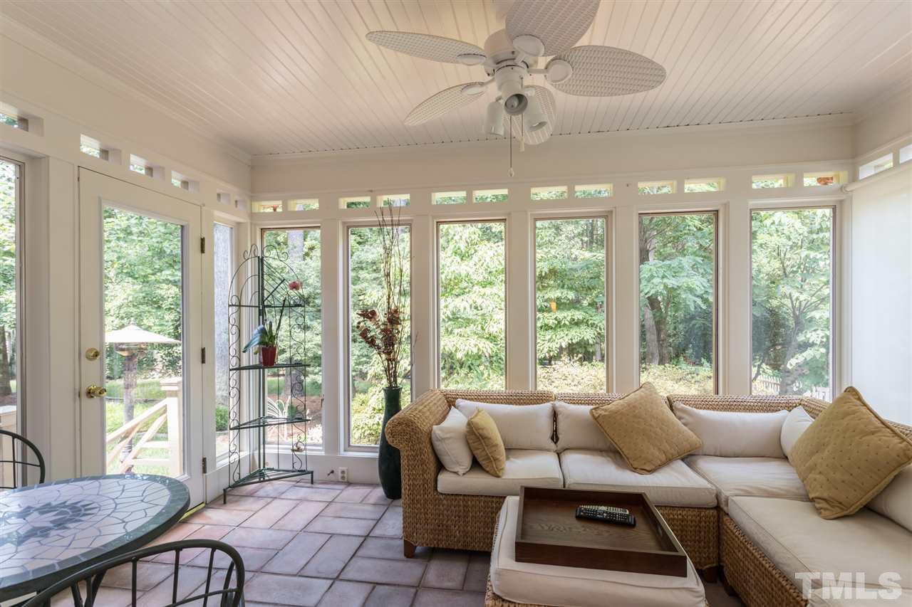 1812 Albacore Lane Raleigh, NC 27612 - Photo 12 of 30 a living room with furniture and a large window