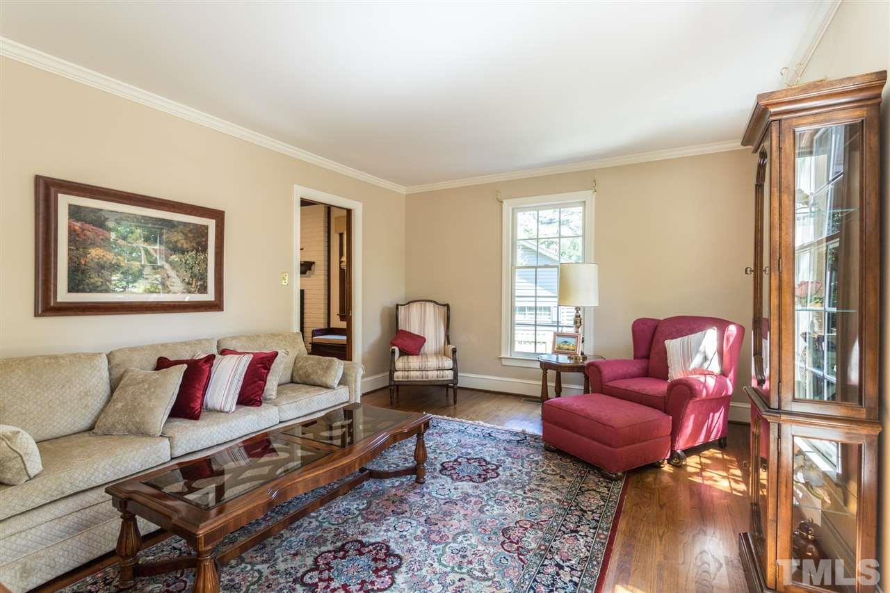1812 Albacore Lane Raleigh, NC 27612 - Photo 3 of 30 a living room with furniture and a window